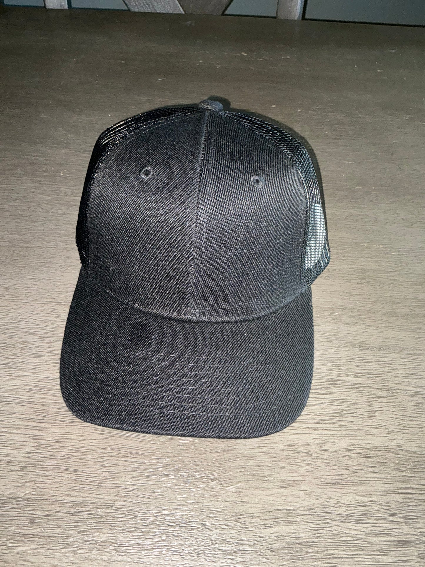 Black trucker hat