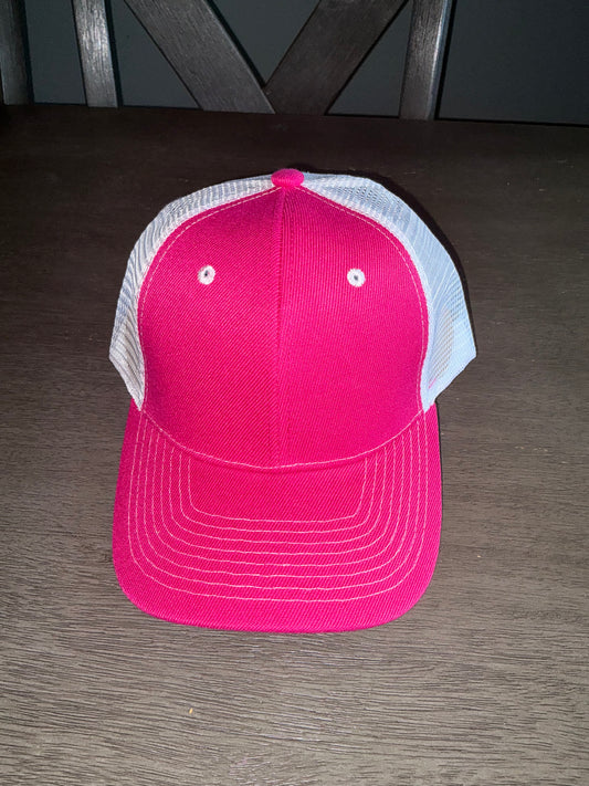 Pink and white trucker hat