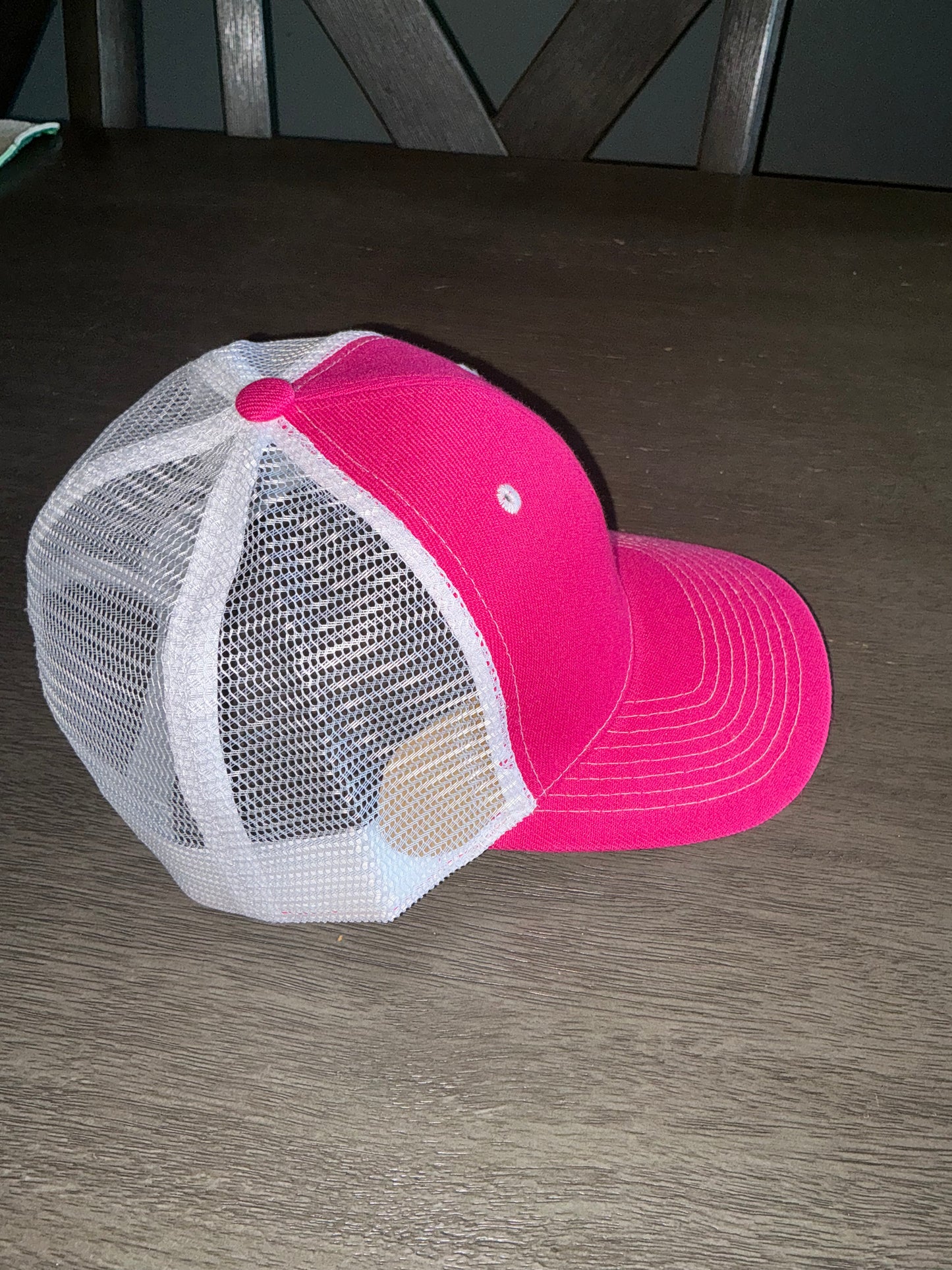 Pink and white trucker hat
