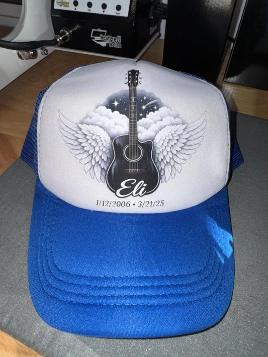 Eli's guitar and Angel wing hat